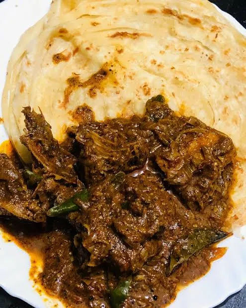 Kuttanadan Duck Roast with Porotta